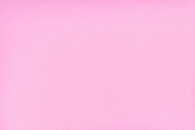 明るいピンク色の折り紙（テクスチャの背景フリー画像）