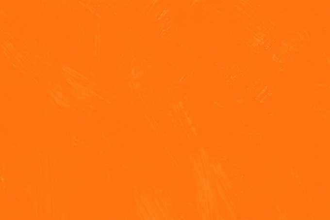 筆跡の残るオレンジ色の背景壁紙（オレンジ 壁紙の背景フリー画像）