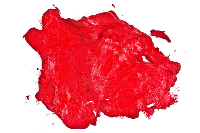 赤い水彩絵具のテクスチャと白い背景（水彩 カラーの背景フリー画像）