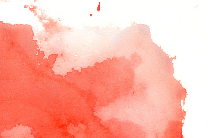紙に染み込む赤い水彩絵の具と白背景（水彩 カラフルの背景フリー画像）
