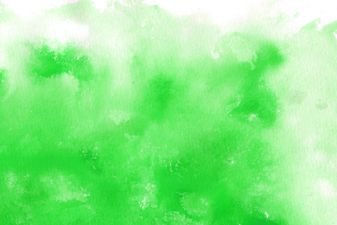 紙に滲む鮮やかなグリーンの水彩背景（水彩 背景の背景フリー画像）